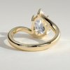106r9li8rz4hw4cotwouvsnwplujxe8jt_ca5ee4fcf18e7b421eb1a99c3434b561 Pear Solitaire with Bypass Band Engagement Ring