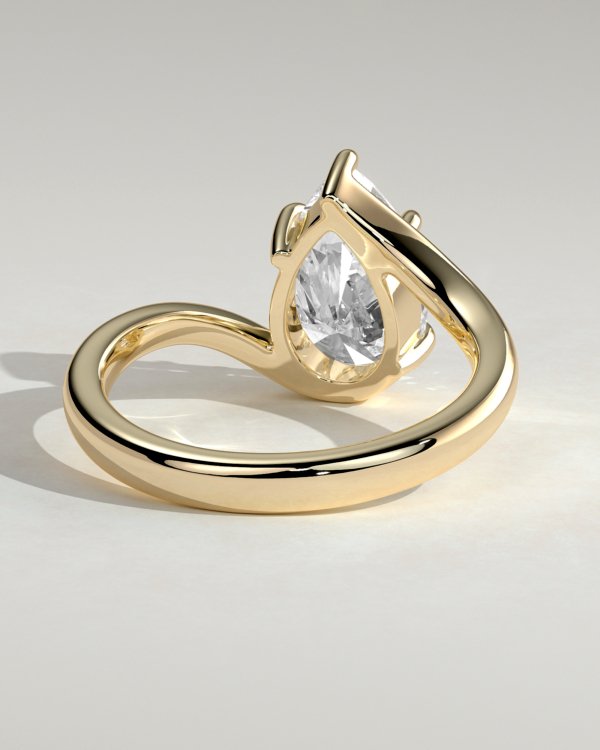 106r9li8rz4hw4cotwouvsnwplujxe8jt_ca5ee4fcf18e7b421eb1a99c3434b561 Pear Solitaire with Bypass Band Engagement Ring