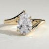 13tda5ltfwsoztqakgfpb5_4zvgvbq8pi_82ae986e137ed05cc342fcc7927f5300 Pear Solitaire with Bypass Band Engagement Ring