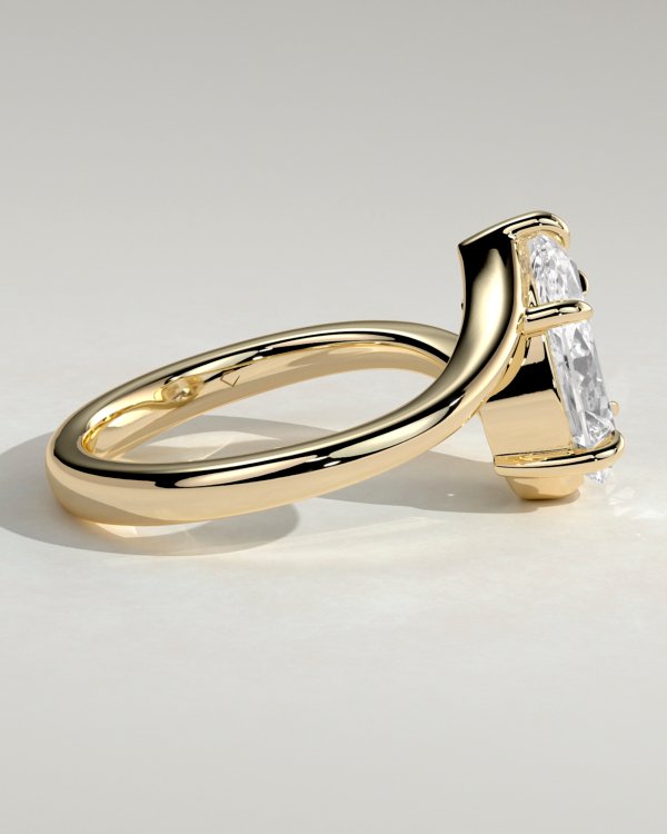 16rsdvmxrrftklul75kuh6zna67zvpxad_622d02865bf13540602693bd4b0fc7c3 Pear Solitaire with Bypass Band Engagement Ring