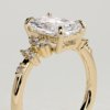 1_p5svm97dl8s0vgm7c_6ta1x6rbv45dq_5f89e80a97b60ed40e7a3aefbf100e47 Radiant 4 Claw Solitaire Clustered Engagement Ring