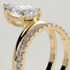1a5bq3jnrzejwz96u4loemekijenxb3m_151f452979f5b0694aa807664e13d72b Double Band Pear Solitaire Engagement Ring