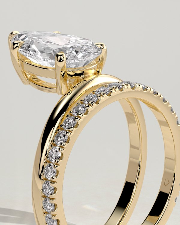 1a5bq3jnrzejwz96u4loemekijenxb3m_151f452979f5b0694aa807664e13d72b Double Band Pear Solitaire Engagement Ring