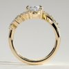 Oval Solitaire with Clustered Accent Stones Engagement Ring
