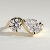 Pear and Round Stone Twist Toi et Moi Ring