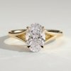Oval Cathedral Solitaire Engagement Ring