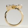 Pear and Round Stone Twist Toi et Moi Ring