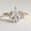 1fvgabypmt57ur8pxmgw2wulamltgk7c_6f70deb878cb96c657a43a9cdfa49bd1 Pear Solitaire with Clustered Stones Engagement Ring