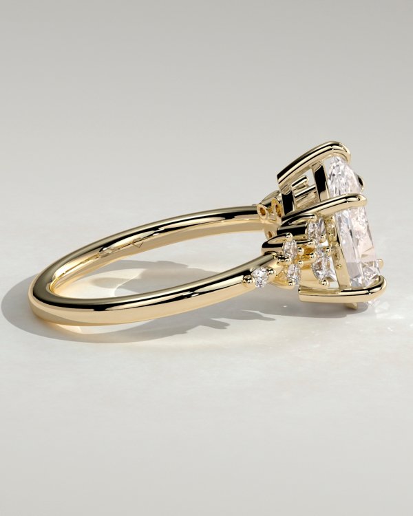 1grklmwra0a1bsta66cipjtt29txrbuue_41f828b1d6e641d314fc4491e05eaea0 Pear Solitaire with Clustered Stones Engagement Ring