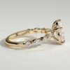 1khdyco_ckoy_g5yocijvooabcbvz3qct_5e046e8d9ce44c372047a71c4f25dda2 Pear Solitaire with Accent Band Engagement Ring