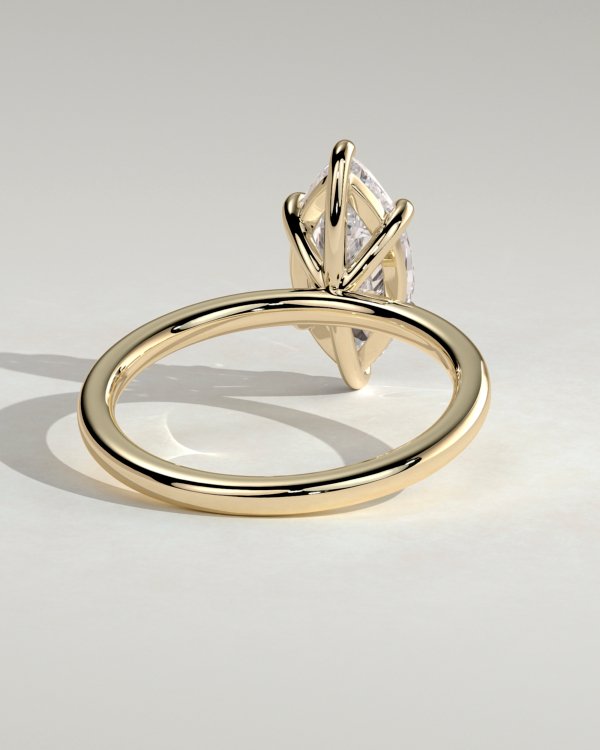 1mq_bch0ul7hxksopxtwiirot4hs5fwod_853372f462b56733e993cea8b77c9066 Classic Marquise 6 Claw Solitaire Engagement Ring