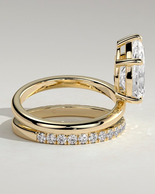1mssybpkdpudr2s5j7knqgyulewruqiwk_3827d2aac6cfa09e90178401bd754011 Double Band Pear Solitaire Engagement Ring