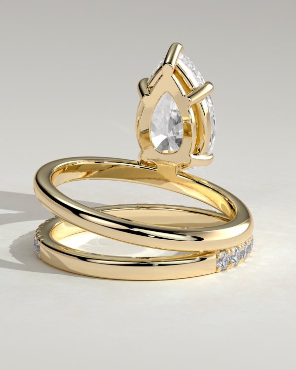 1oth_dkyouk7sktnwhcq_k6gcza57wmoo_a98005963d712c3cf0cb7a2fecf930ff Double Band Pear Solitaire Engagement Ring