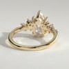 1pl5r5wmpzfwnxpacxges_ox4j7mogkr6_9e519102c1fd712504b5dcc97ce64694 Pear Solitaire with Clustered Stones Engagement Ring