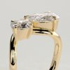 Pear and Round Stone Twist Toi et Moi Ring
