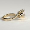 Pear and Round Stone Twist Toi et Moi Ring