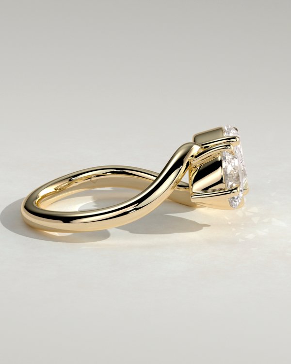 Pear and Round Stone Twist Toi et Moi Ring