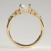 1uidtxtwfmm_ug_ltz5_kdwq8mzkbalex_f04e0615fc3030f08234a41d1f73f97a Radiant 4 Claw Solitaire Clustered Engagement Ring