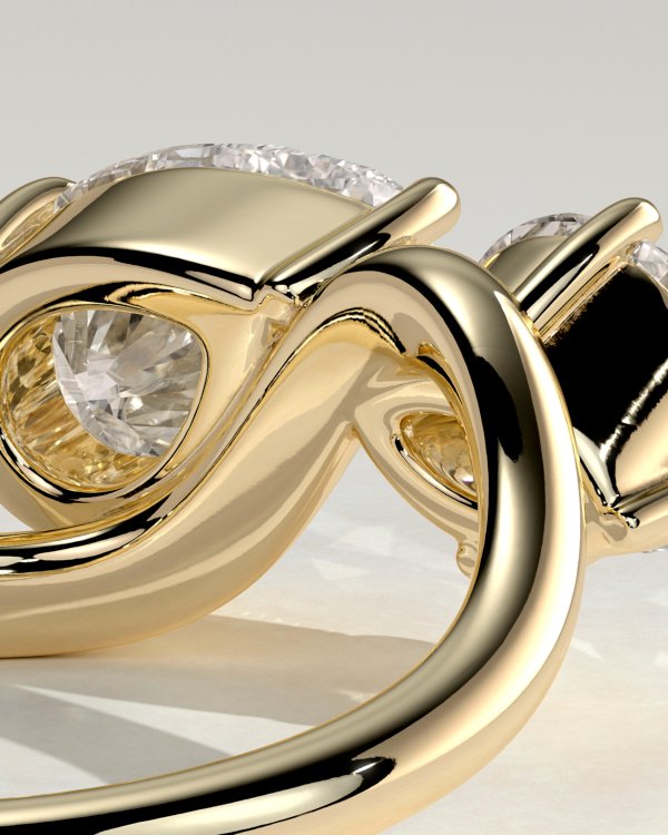 Pear and Round Stone Twist Toi et Moi Ring