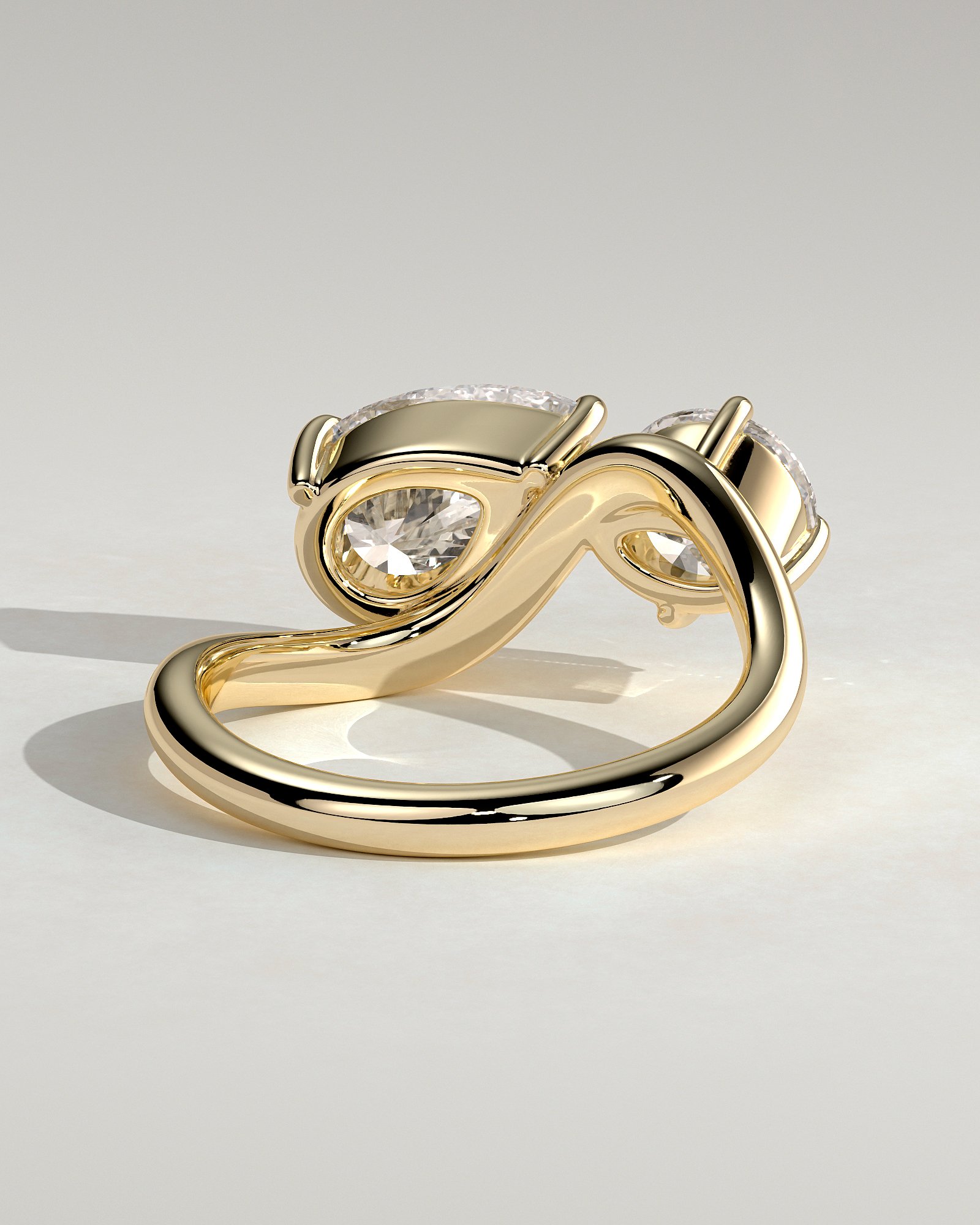 Pear and Round Stone Twist Toi et Moi Ring - Image 3