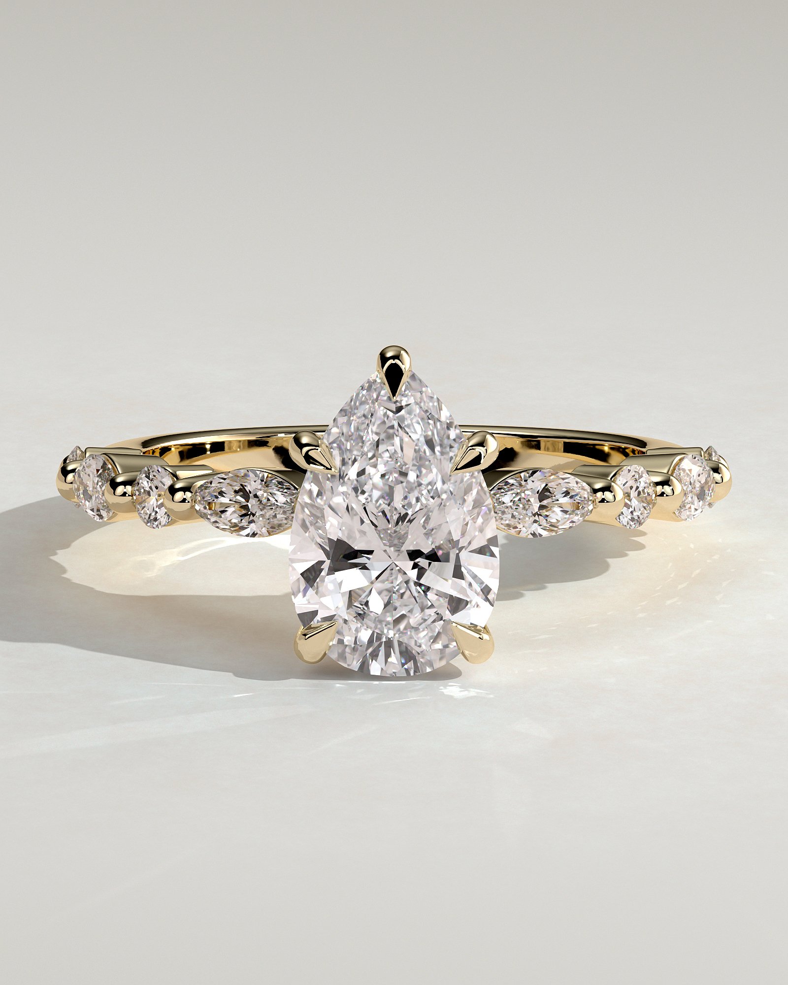 Pear Solitaire with Accent Band Engagement Ring