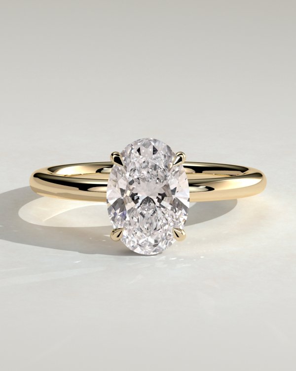 1z_pdpx3sch_0ay_kz1sl7xl8unnwp7ke_1af7d5a2215a5dbdb6238810f24d800e Oval Solitaire Hidden Halo Engagement Ring