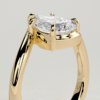 1zckp_wyui18jddejn3orz3uxj1k5ct7w_6e1e152fe3ef19f383e64fbc9cdb5da3 Pear Solitaire with Bypass Band Engagement Ring