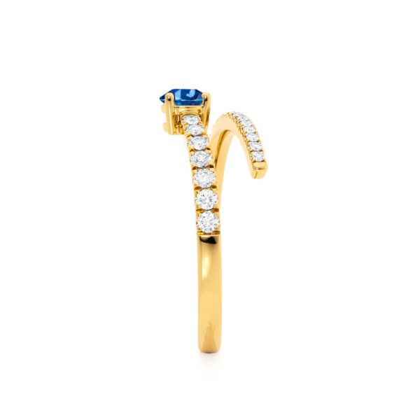 Celestine-pear-blue-sapphire-ring-yellow-gold-Lily-Arkwright-Image-3_900x.jpg Pear Blue Sapphire Split Shank Diamond Ring