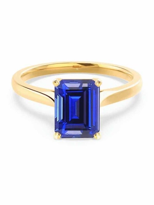 FlorenceEmeraldBlueSapphireLabDiamondEngagementRingYellowGoldSolitaireLilyArkwright1.jpg Emerald Cut Blue Sapphire Engagement Ring