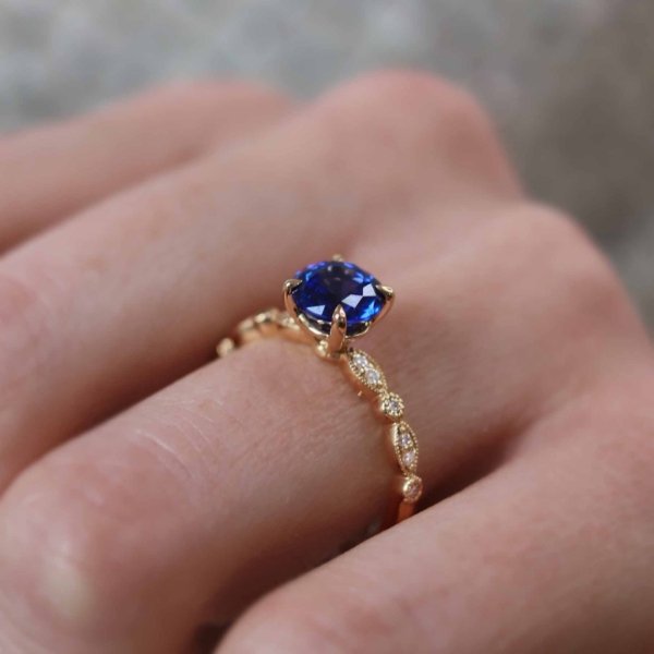 HopeBluesapphire_caratWeight_YellowgoldLilyArkwrightsquare_1600x.jpg Round Blue Sapphire Shoulder Set Engagement Ring