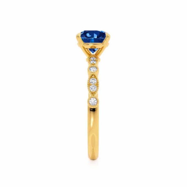 HopeRoundBlueSapphireLabDiamondEngagementRingYellowGold4ProngShoulderSetLilyArkwright3_900x.jpg Round Blue Sapphire Shoulder Set Engagement Ring